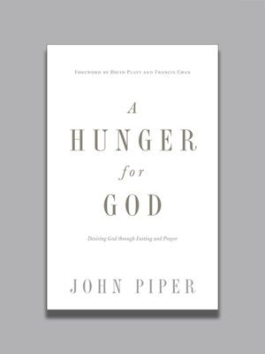 Book cover of A Hunger for God: Desiring God through Fasting and Prayer by John Piper, a Christian book on fasting and seeking God.